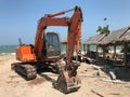 Excavator on the beach Royalty Free Stock Photo