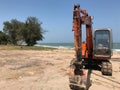 Excavator on the beach Royalty Free Stock Photo