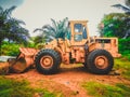 Old excavator in the middle of the Bush. Liberia, West Africa Royalty Free Stock Photo