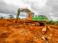 Old excavator. Wear industry in Liberia Royalty Free Stock Photo