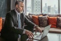 Old executive manager director working with note book on the desk Royalty Free Stock Photo