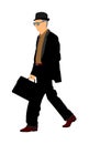 Old experienced lawyer with suitcase walking . Elegant senior gentleman. Mature businessman.