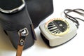 Old exposure meter and camera in leather case Royalty Free Stock Photo