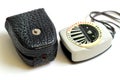 Old exposure meter and leather case Royalty Free Stock Photo