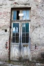 Old outdoor double-leaf wooden glazed door