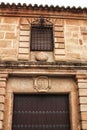 Old facade and entrance of majestic house in villanueva de los Infantes, Spain