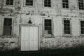 Old facade with lamp, door and windows