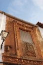 Old facade of majestic house with coat of arms in Alcaraz, Spain Royalty Free Stock Photo