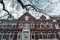 Old facade of a two-story building in Rotterdam, Belgium.