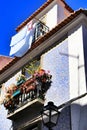 Old facade of typical Lisbon house with hanging clothes Royalty Free Stock Photo