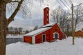 Old factory hose tower of red ochre painted wood Royalty Free Stock Photo