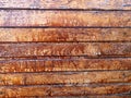 Old faded dull pine natural dark wooden background