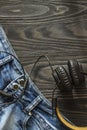 The old faded jeans and headphones