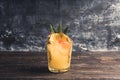 Old fahioned pineapple beverage on rustic background Royalty Free Stock Photo