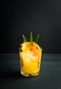 Old fahioned pineapple beverage on rustic background Royalty Free Stock Photo