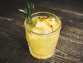 Old fahioned pineapple beverage on rustic background Royalty Free Stock Photo