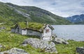 Old fairytale like house of wood with chimney of stacked slate Royalty Free Stock Photo