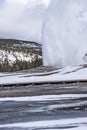 Old Faithful Eruption in Winter