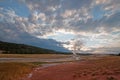 Old Faithful Geyser at dawn as seen from the Old Faithful Inn in Yellowstone National Park in Wyoming Royalty Free Stock Photo