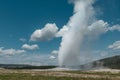 Old Faithful Geyser erupting during the day in Yellowstone National Park Royalty Free Stock Photo