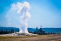 Old Faithful Geyser Erupting at Yellowstone National Park. Royalty Free Stock Photo