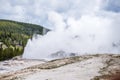 Old Faithful geyser erupting - Yellowstone National Park- Yellow Royalty Free Stock Photo