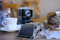 old family photos, empty base, stack of old family vintage photographs of 50s, 40s, black retro accordion camera on wooden table, Royalty Free Stock Photo