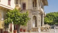 The old famous City Palace. The facade of the building with elegant columns, balconies, carved lattices. Royalty Free Stock Photo