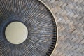 Old fan grill on woven bamboo Royalty Free Stock Photo