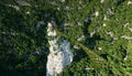 Old fantsay castle on a high cliff, rock. Aerial view. fabulous landscape