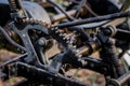 An old farm machine in a farm. Old plow on the lawn in a farm. Royalty Free Stock Photo