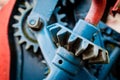 Old farm machinery on a farm. Root mechanisms and wheels in agricultural machinery from the last century. Royalty Free Stock Photo