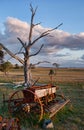 Old farm machinery in field Royalty Free Stock Photo