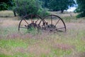 Old Farm Machinery in an Overgrown Field Royalty Free Stock Photo