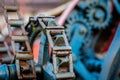 Old farm machinery on a farm. Root mechanisms and wheels in agricultural machinery from the last century. Royalty Free Stock Photo