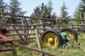 Old farm plow, Abandoned farm implement in the village, rusted machinery Royalty Free Stock Photo