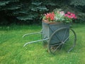 Old farm retro flower wagon Royalty Free Stock Photo