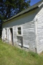 Old farm shed stand idle in a deteriorating state Royalty Free Stock Photo