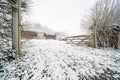 An old farm with a snowy car Royalty Free Stock Photo