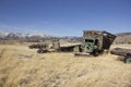 Old farm truck in a field of junk Royalty Free Stock Photo