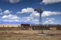 Old Farm With a Windmill During the Day