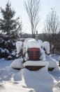 A Red Tractor in the snow Royalty Free Stock Photo