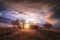 Old Farmhouse at Sunset in a Rural Setting Royalty Free Stock Photo
