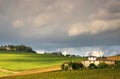 Old Farmhouse with rows of wineyard in autumn in tuscany