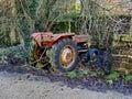 Old Farming Tractor Abandoned Against a Drystone Wall