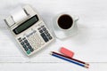 Old fashion business calculator on white desktop Royalty Free Stock Photo