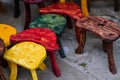 Old fashion colored chairs at market