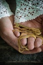 Old fashion lady holds a golden key in her hands Royalty Free Stock Photo