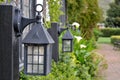 Old fashion lantern lights near path Royalty Free Stock Photo