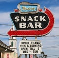 An old fashion neon Sign for a Snack Bar on a local Street Royalty Free Stock Photo